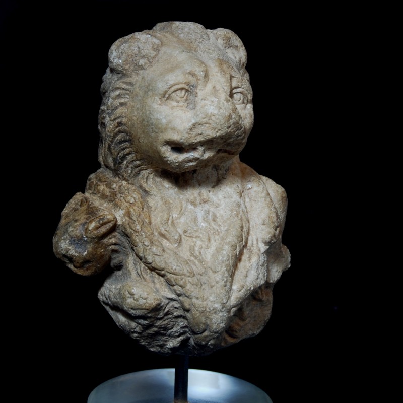 Lion-headed figure from private collection
