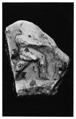 Figure approaching rock from Sarmizegetusa
