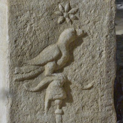 Altar with inscription and symbolic figures from Ptuj