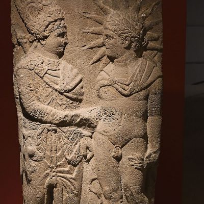 Antiochus I shakes hands with naked Apollo-Mithras-Helios