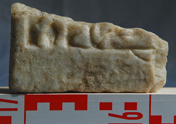 Marble fragment with torchbearer from Cincșor.