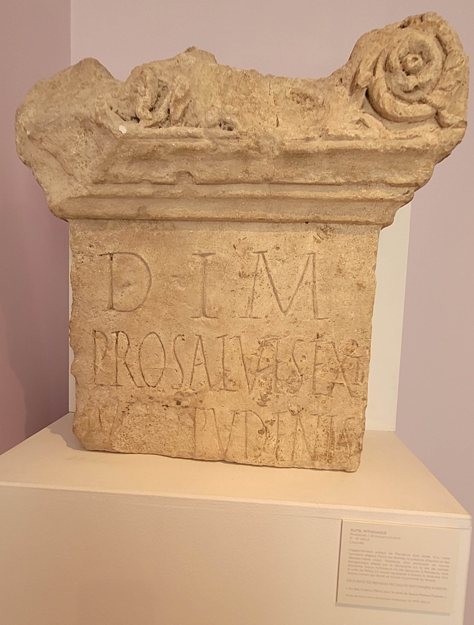 Stela dedicated to Mithras Invictus, found in 1895–1896 at Epamantodurum (modern Mandeure), in the territory of the civitas Sequanorum (Gallia Belgica). The inscription records a vow to Mithras Invictus made for the welfare of Sextus Maenius Pudens.