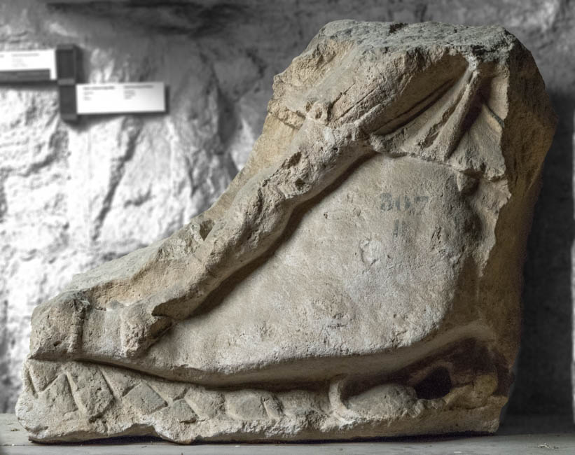 This large limestone fragment from Roman Salona preserves the hind part of the bull together with Mithras’ foot and traces of his red tunic.