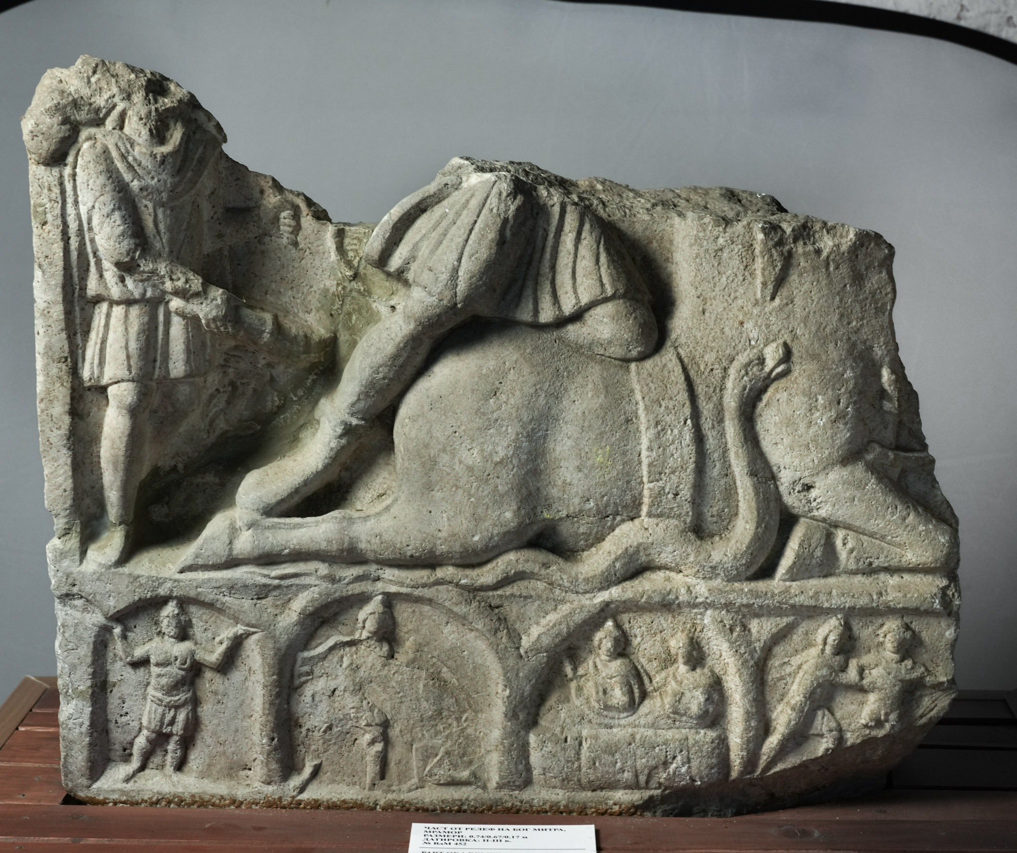 Fragmentary Mithraic relief from Ratiaria depicting the tauroctony above a series of narrative scenes from the myth of Mithras and Sol.