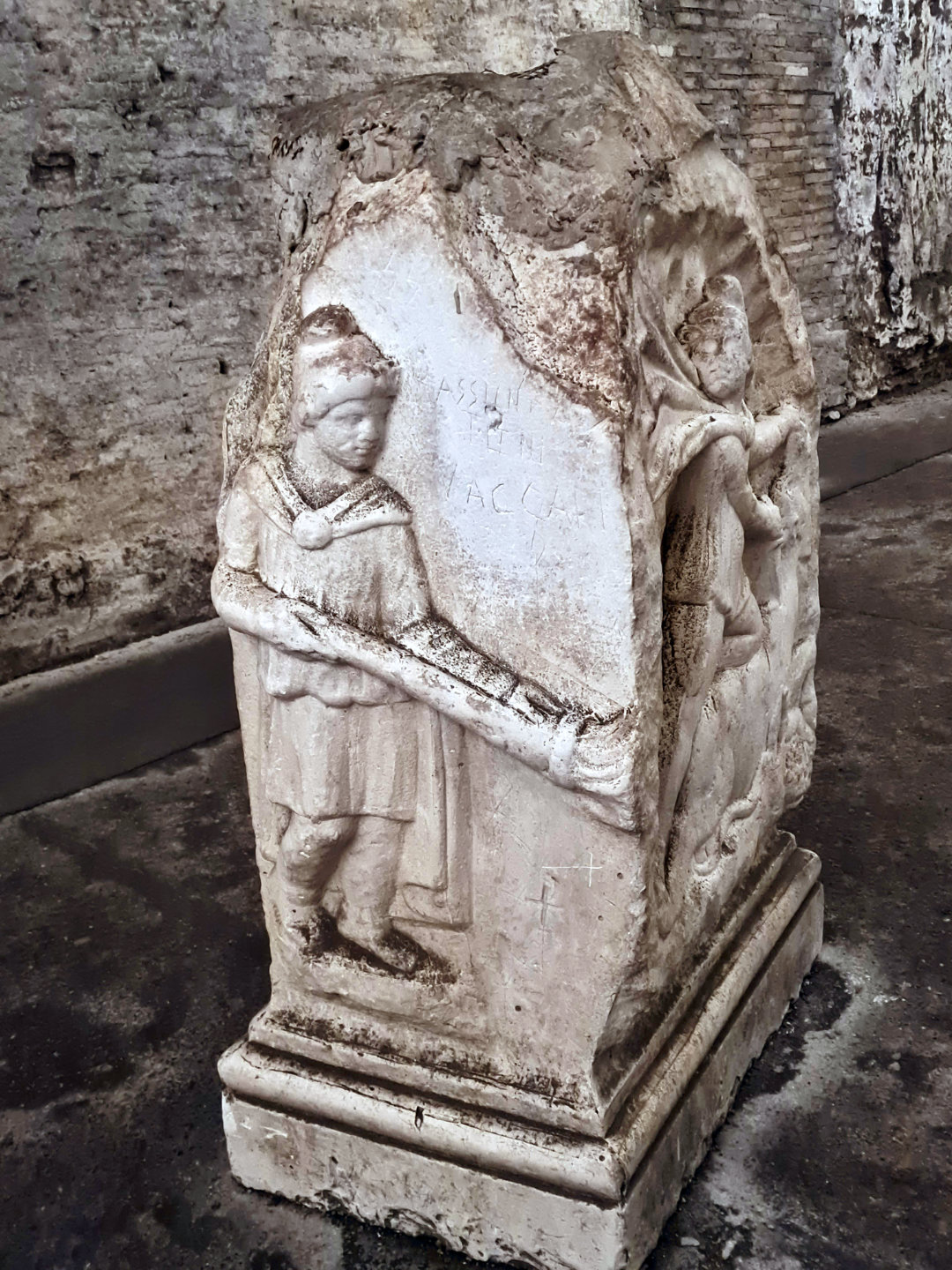 Main altar from the San Clemente Mithraeum, left side.