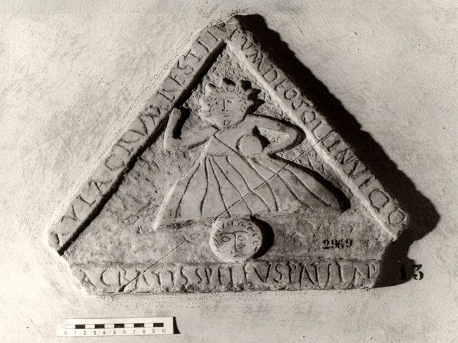 Small triangular slab bearing a Latin inscription referring to Sol Invictus and to a sacred cave, probably dating to the 4th century AD.
