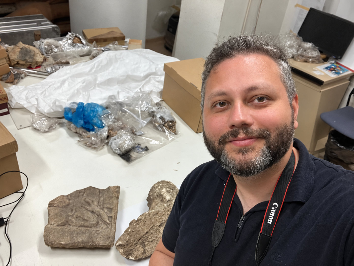 Csaba Szabó documenting the Mithraic collection at the Museum of Deva, August 2026.